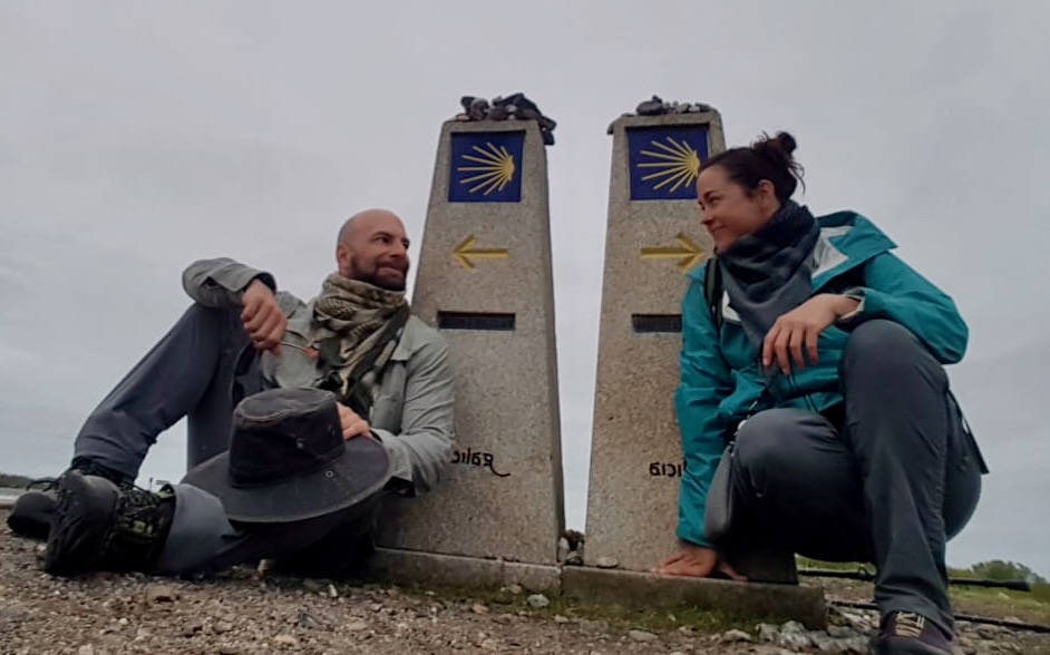Kim and Cam on the Camino de Santiago, deciding between the routes to Muxía and Finisterre